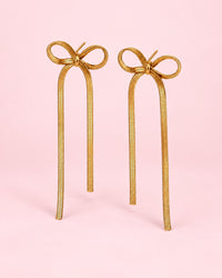 Pair of gold-tone chain bow earrings with long, flat chain tails