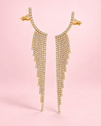 Pair of gold-tone ear climbers: a curved line of clear rhinestones with a long tapered fringe