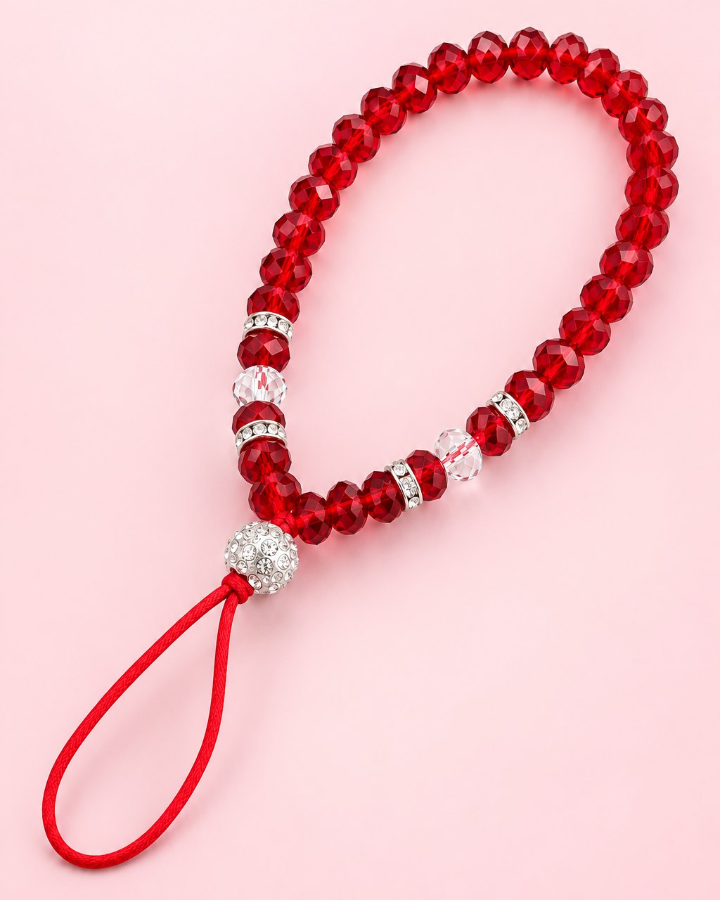 Red crystal bead phone wrist strap with sparkly spacers and a red cord loop
