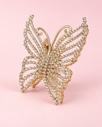 Gold-tone butterfly claw clip with wings set with clear rhinestones