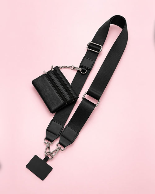 Black crossbody phone strap with silver-tone clasps, a phone tab and a mini black zip pouch