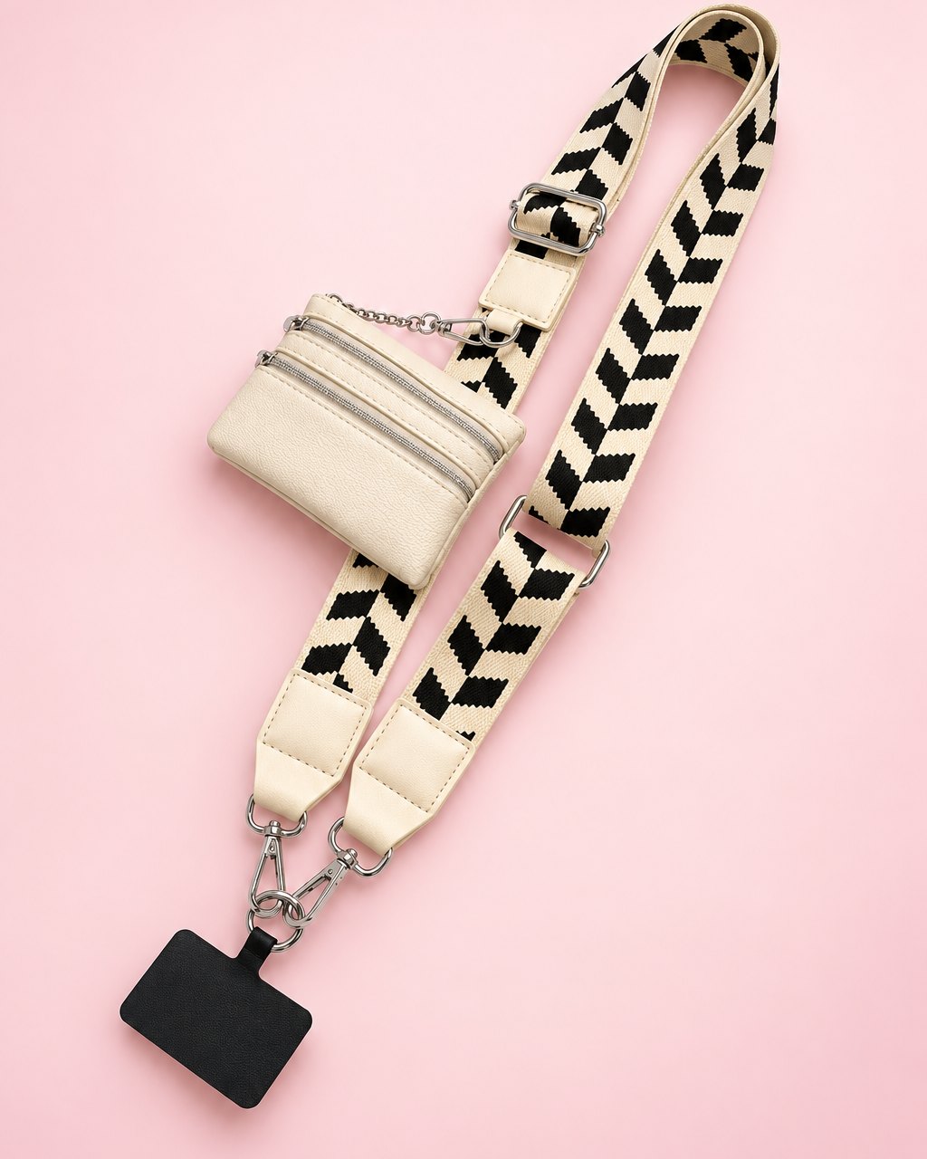 Cream phone strap with a black chevron weave and a cream zip pouch