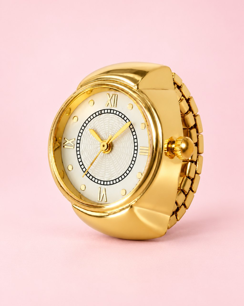 Gold-tone ring watch with a cream Roman numeral dial