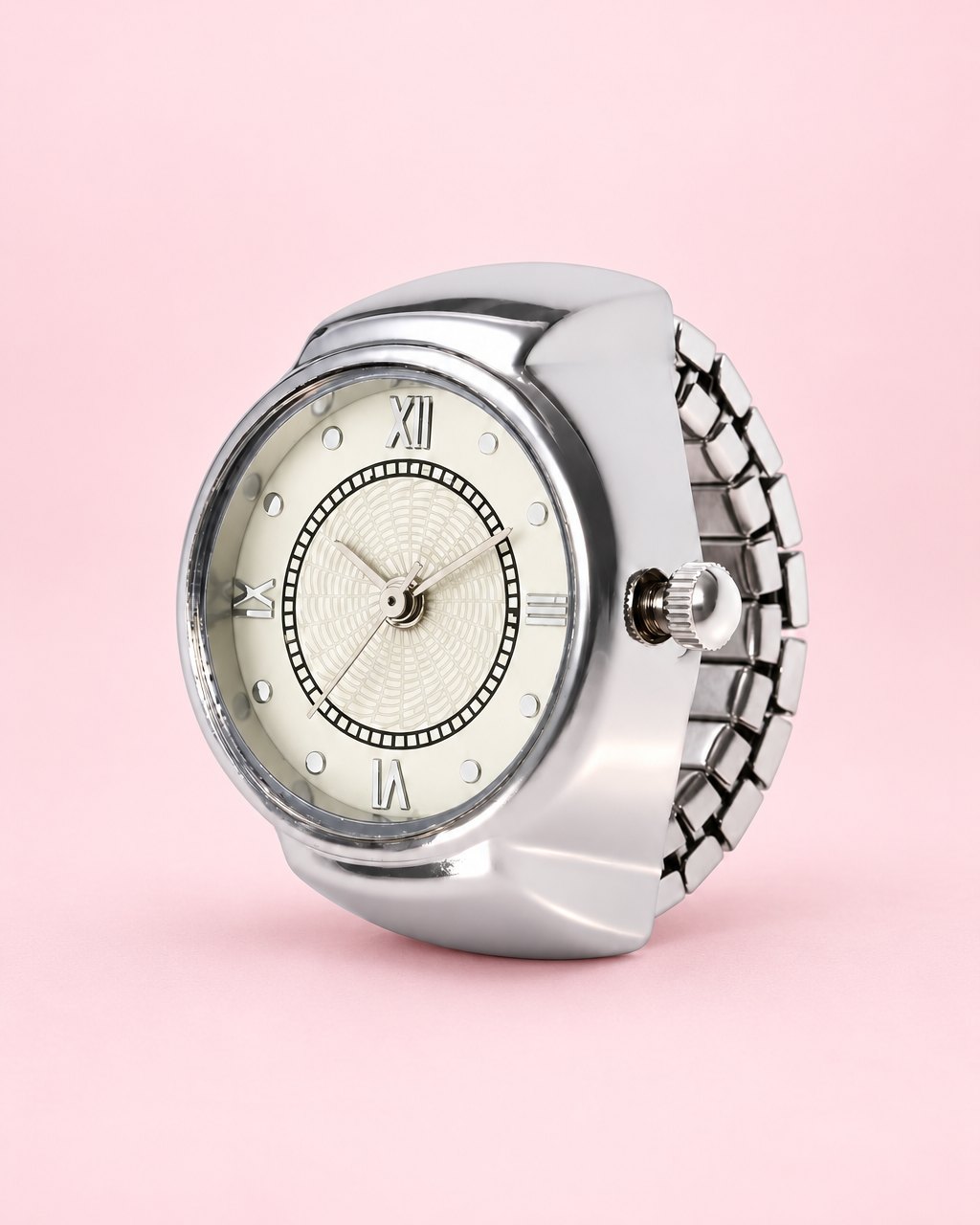 Silver-tone ring watch with a cream Roman numeral dial